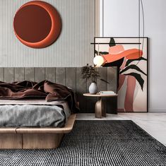 a bedroom with a bed, nightstands and paintings on the wall behind it in shades of orange