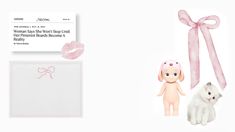 two stuffed animals are next to an envelope with a pink ribbon on the front and side