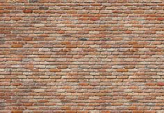 an old brick wall is shown in this image