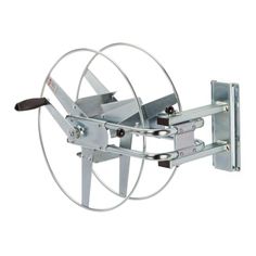 an image of a wall mounted tv bracket with two wheels on it's side