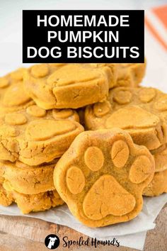 homemade pumpkin dog biscuits stacked on top of each other with text overlay that reads homemade pumpkin dog biscuits