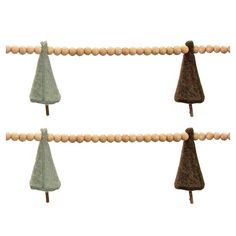 three felt christmas trees hanging on a string with beads and wood bead around them