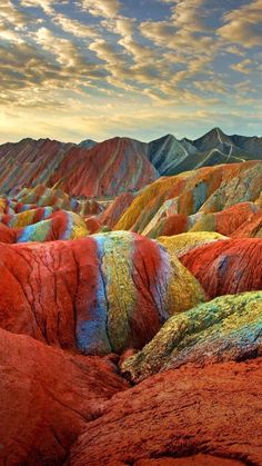 the colorful hills are painted with different colors