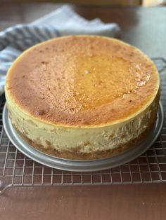 a cake sitting on top of a cooling rack