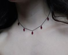 Artemis Dreaming. Βeauty and magic in the most delicately dark way. This necklace is composed of black rhodium over 925 sterling silver delicate sparkling chain and 5 tiny burgundy agate drops. You can choose between these chain lengths: 15 / 16 / 17 / 18 inches Not sure which length to buy? We can add a 1 inch extender chain. Just write a note at checkout! ❈ We send all our items with registered mail. ❉ Due to the organic nature of stones, there might be a slight variation in colour, size and shape. ✺ All items come packaged in a quality velvet pouch ready for gift giving. ✽ If you want to make a special order, just contact us! Artemis Dreaming, Emo Jewelry, Dark Necklace, Red Stone Necklace, Organic Nature, Jewelry Lookbook, Black Necklace, Black Rhodium, Dream Jewelry