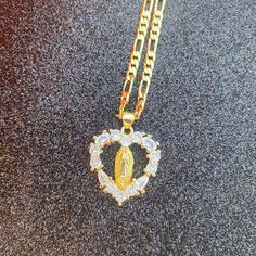 Beautiful Heart Shaped Gold Plated Virgencita Necklace - take her with you anywhere you go, a beautiful gift for a loved one. 23 inch chain 14k Gold Plated Virgencita Necklace, Necklaces Guadalupe, Gold Virgencita Necklace, Gold Our Lady Of Guadalupe Necklace In 14k Gold, Spiritual Yellow Gold Our Lady Of Guadalupe Jewelry, Beauty Gift Card, Beautiful Heart, Beauty Gift, Charm Jewelry