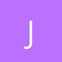 the letter j on a purple background