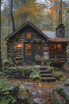 a log cabin in the woods with steps leading up to it's front door