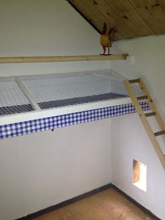 there is a ladder on the top of this bunk bed that has been built into the wall