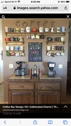 a coffee bar with lots of cups hanging on the wall