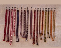 a number of different types of bracelets with numbers on them in various colors and sizes