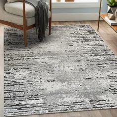 Introduce a contemporary boho style to your home with Minimalist Distressed Abstract Area Rug in gray. This rug enhances various interior styles with its chic gray patterns, and complements modern and traditional dcor themes, furniture, and accessories. This high-quality rug is made from 100% premium polypropylene fibers. High and low fibers with charcoal accent colors add an interesting focal point to your floors. It is durable, feels soft underfoot and is ideal for different areas of your home 8x10 Area Rug, 8x10 Rug, Modern And Traditional Decor, Abstract Area Rug, 8x10 Rugs, 8x10 Area Rugs, Grey Pattern, Interior Styles, Mudroom Furniture