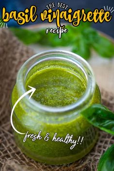 a green smoothie in a glass jar with basil on top and the recipe below