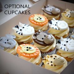 cupcakes in a box are decorated with animal faces