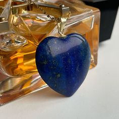 Luxury Lapis Lazuli Heart pendant featuring 18k gold filled 'star' chain over stainless steel. (doesn't change color). A deep blue stone from Afghanistan. This stone has the powers to heal and build any relationship! Comes in branded gift box and postcards. A great gift for those who want to show some attention and love to the recipient. 🌀The benefits of wearing LAPIS LAZULI jewelry: ➜ Lapis Lazuli stones are believed to help bring about harmony in relationships. ➜This is also a stone of sincer Blue Heart Necklace, Necklace Luxury, Rose Quartz Jewelry, Lapis Lazuli Jewelry, Star Chain, Rose Quartz Pendant, Lapis Lazuli Stone, Gift For Mother, Gold Sparkle