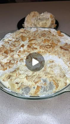 a glass dish filled with food on top of a table