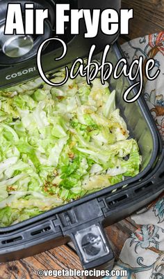 an air fryer with cabbage in it and the words, air fryer cabbage