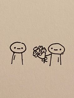 two stick figures are holding flowers in their hands