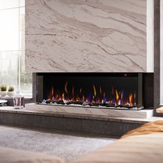 Designed to impress, the IgniteXL® Bold Linear Electric Fireplace features flexible and industry unique display options including front-facing, right or left corner and bay installations. This modern, built-in fireplace comes with a patented mirror effect that increases depth, plus advanced controls to maximize customization and enjoyment. Get creative and connect multiple units together for a dramatic statement. Think big, think bold! Ignite XL BOLD Is Available In Five Sizes: 50", 60", 74", 88 Dimplex Ignite Xl Bold, Modern Fireplace Gas, Modern Fireplace Vaulted Ceiling, Electric Fireplace In Dining Room, Slab Fireplace Surround, Ventless Gas Fireplace Ideas, Fireplace Tile Ideas Modern, Linear Fireplace With Tv Above, Modern Fireplace Wall