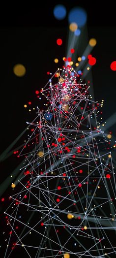 an abstract christmas tree is shown with lights