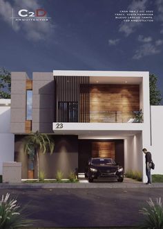 a car is parked in front of a modern house