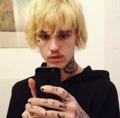 lil peep holding a phone in the mirror with blond fluffy hair going past his ears Long Hair, Tattoos, Music, Hair