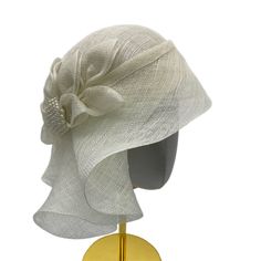 TIMELESS BEAUTY EXUDES AN AURA OF BLISS AROUND YOU Couture hat with bow and brooch Kentucky Derby Wedding headwear This beautiful women's couture hat with golden trim&brooch looks amazingly stunning and ideally accessorizes a multitude of your apparel. Whether you choose a classical dress or a modern and stylish outfit for the upcoming event, this cloche will surely bring out the magnetism and charisma you are looking for. Created using high-quality handwoven sinamay fiber which is so lightweigh Elegant Evening Cloche Headpiece, Elegant Evening Cloche Hat With Structured Crown, Structured Crown Cloche Hat For Kentucky Derby, Elegant Cloche Headpiece For Formal Occasions, Elegant Formal Cloche Headpiece, Elegant Church Headpiece With Short Brim, Elegant Headpiece For Church And Royal Ascot, Elegant Headpiece With Structured Crown For Events, Elegant Cloche Hat With Structured Crown For Formal Events