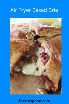 an apple and cranberry pastry with the words air fryer baked brie