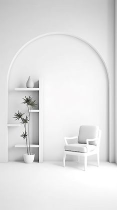 a white chair sitting in front of a book shelf next to a potted plant