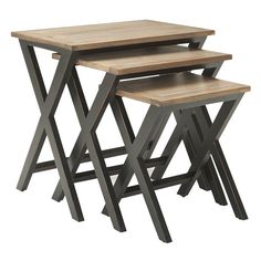 three wooden tables sitting on top of each other