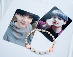 "Show your love for your favorite member with our BTS bias bracelet. Each bracelet is made of 14k gold filled beads and your choice color of seed beads with two star beads. Pictured photo is in the color \"PEACH\".  **FOR COLOR OPTIONS PLEASE SEE 3rd PHOTO** Note: Each purchase will come with 2 photo cards. They will vary from photo and be randomly selected. Please choose your color in \"PERSONALIZATION\" section. Please message me for any questions :)" Personalized White Kpop Beaded Bracelets, Personalized Black Kpop Bracelets, Customized Black Kpop Bracelets, Personalized Multicolor Kpop Style Bracelets, Customized Multicolor Kpop Bracelets, Star Beads, 2 Photos, Picture Photo, Photo Cards