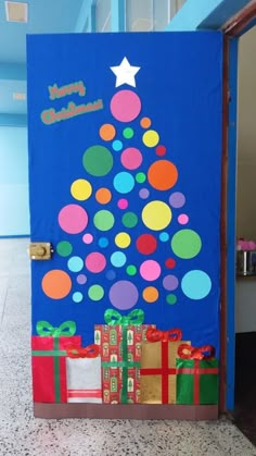 a door decorated to look like a christmas tree