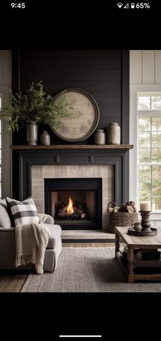 a living room filled with furniture and a fire place in the middle of the room