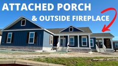 a blue house with the words attached porch and outside fireplace in front of it