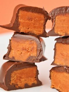 several pieces of chocolate peanut butter fudge stacked on top of each other