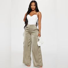 Olive Satin Cargo Pants High Waist Bottoms With Cargo Pockets For Day Out, Chic High-waisted Cargo Pants For Day Out, Chic Cargo Trousers With Pockets, Chic Long Pants With Cargo Pockets, Chic Cargo Bottoms Long Pants, Chic High Waist Wide Leg Pants With Cargo Pockets, Chic Cargo Pants With Pockets For Day Out, Chic High-waist Pants With Cargo Pockets, Chic Pants With Cargo Pockets