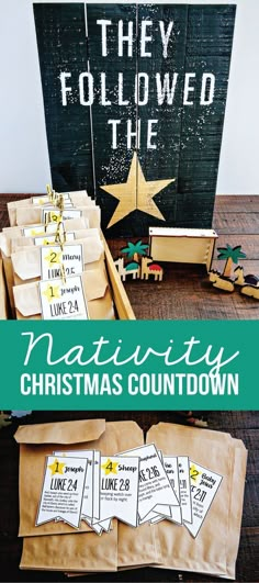 the nativity christmas countdown is on display in front of a sign and other decorations