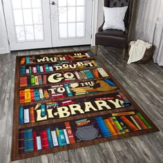 there is a rug that has books on it