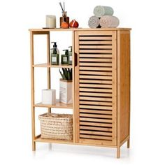 Are you looking for a multi-functional bathroom storage cabinet to help you organize messy bathroom items? Our multi-layer bathroom shelf is your ideal choice! \nThe freestanding bathroom cabinet with 3 shelves and a large cabinet accommodates toiletries, towels, decorative things and more. It is made of premium bamboo to ensure load-bearing and long-lasting service time. With a compact and space-saving structure, this portable storage shelf can Pedestal Sink Storage Ideas, Sink Storage Ideas, Pedestal Sink Storage, Bamboo Cabinets, Over Toilet Storage, Bamboo Floor, Bamboo Storage, Bathroom Organization Ideas, Large Storage Cabinets