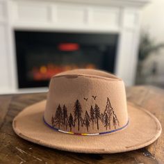 Beautiful Hand Burned Fedora Hat. Beautiful Southwestern Style With Mountains.Beaded Rim Bohemian Fedora Felt Hat For Outdoor, Bohemian Hats For Fall Outdoor Use, Bohemian Hat Bands For Outdoor Fall Events, Bohemian Hats For Outdoor Fall Activities, Bohemian Hats For Outdoor Fall, Bohemian Flat Brim Felt Hat For Outdoor, Bohemian Style Flat Brim Felt Hat For Outdoor, Bohemian Fall Outdoor Hat, Brown Bohemian Felt Hat For Outdoor