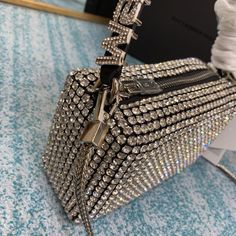 Brand new version❤️chain purchased separately⚠️
The gorgeous Alexander Wang⃝ diamond square bag ؔʶ̷ ˡ̲̮ ؔʶ̷✧
The imported diamond mesh interior has a shiny sheepskin exterior, and the blingbling effect under the night light is very eye-catching. It has a high turnaround rate and will be praised by people wherever you put it.˃̶͈̀௰˂̶͈́
And the bag is surprisingly easy to match, whether it is girly man style, daily casual style, or sexy street style, everything is just right with this bag ~ square bag
A must-have item that combines versatility, handsomeness and practicality •̀ᴗ-✧
Size: 16×11×7cm Luxury Rhinestone Bags For Night Out, Luxury Sparkling Bags As Gifts, Luxury Silver Crystal Bag, Luxury Crystal Silver Bag, Luxury Silver Rectangular Evening Bag, Designer Square Evening Bag For Party, Luxury Bling Bag As Gift, Luxury Bags With Bling, Luxury Bling Bags For Gift