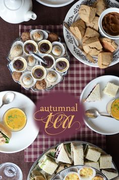 a table topped with plates and bowls filled with food