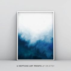 a blue and white poster with the words neptune art prints / on etsy written below it