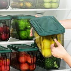 a refrigerator filled with lots of different types of fruits and veggies in containers