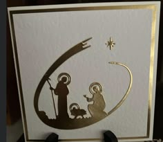 a christmas card with an image of the birth of jesus and baby jesus on it