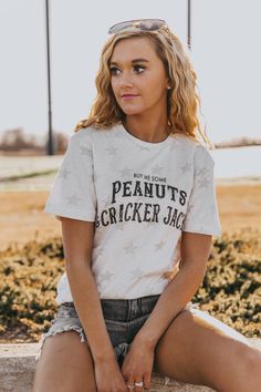 Can't stop, won't stop with our obsession over this t-shirt! The star of any show- this anything-but-basic tee boasts subtle, slouchy style and a standard unisex fit. Size up for an oversized look and pair it with biker shorts! Versatile Graphic Tees Star Tee Content + Care 60% COTTON 40 % POLYESTER Machine wash cold w Baseball Mom Outfits, Baseball Game Outfit, Baseball Graphic Tees, Tailgate Outfit, Cracker Jacks, Game Outfit, Slouchy Style, Can't Stop Won't Stop, Baseball Tees