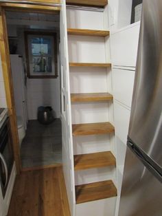 the kitchen is clean and ready to be used as a storage area for cooking utensils