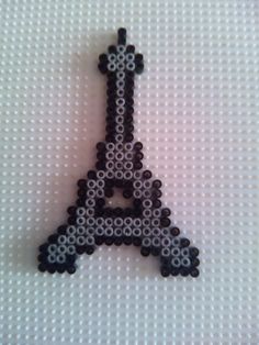 the bead pattern is made to look like an eiffel tower