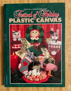 a book with knitted christmas decorations on it