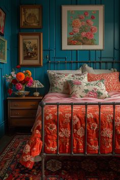 a bedroom with blue walls and floral bedding